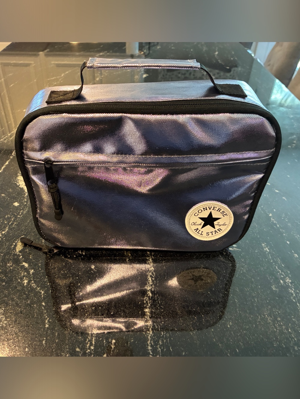 Converse metallic purple lunchbox.
